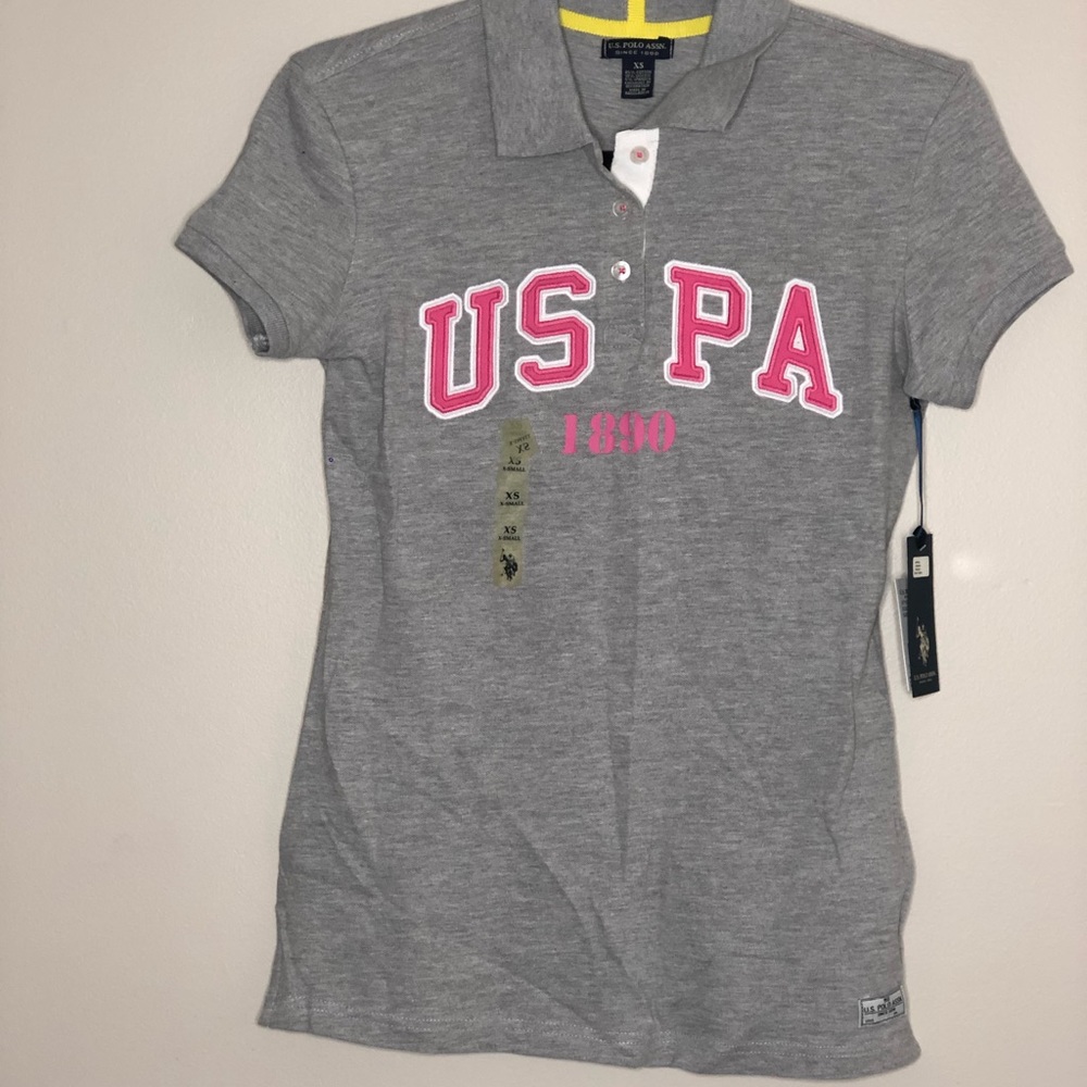 Brand new USPA polo grey and pink